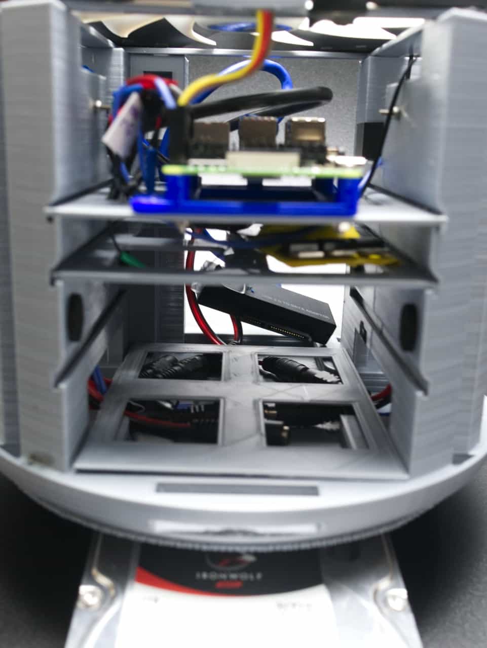 Front view showing 1 of 3 ventilation slits and felt pads in HDD compartment