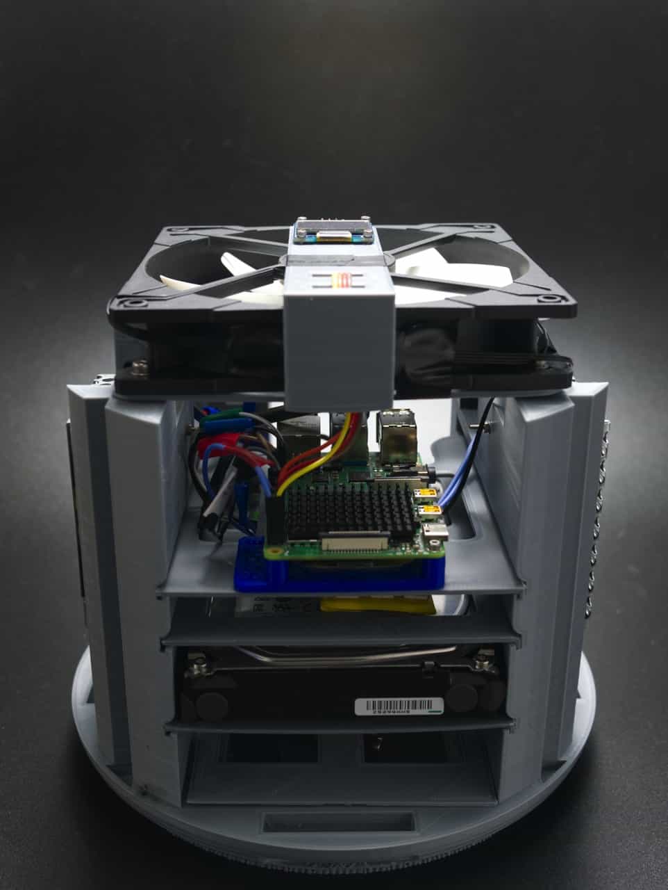 Left side view showing connectors, wiring and 12V PSU that powers the HDD and top fan
